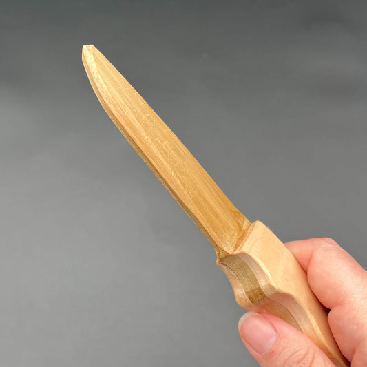 Hunting Wooden Knife for wax play and knife play, made from wood with a sharp tip and straight edge.
