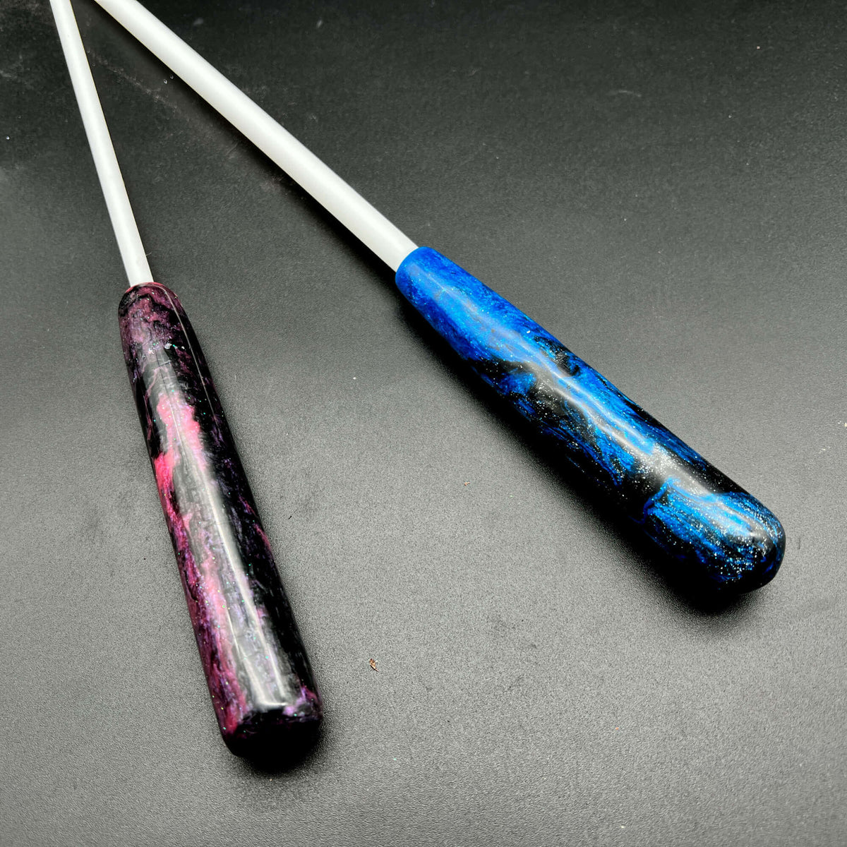 Canes with Resin Handles featuring colorful resin grips in purple and blue.