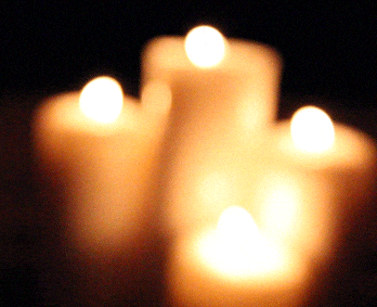 Softly lit candles creating the ambiance for Wax Play.