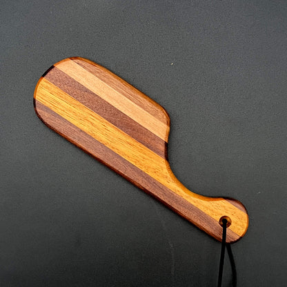 Small Pocket Paddle made from Black Walnut and Maple with a unique striped design.