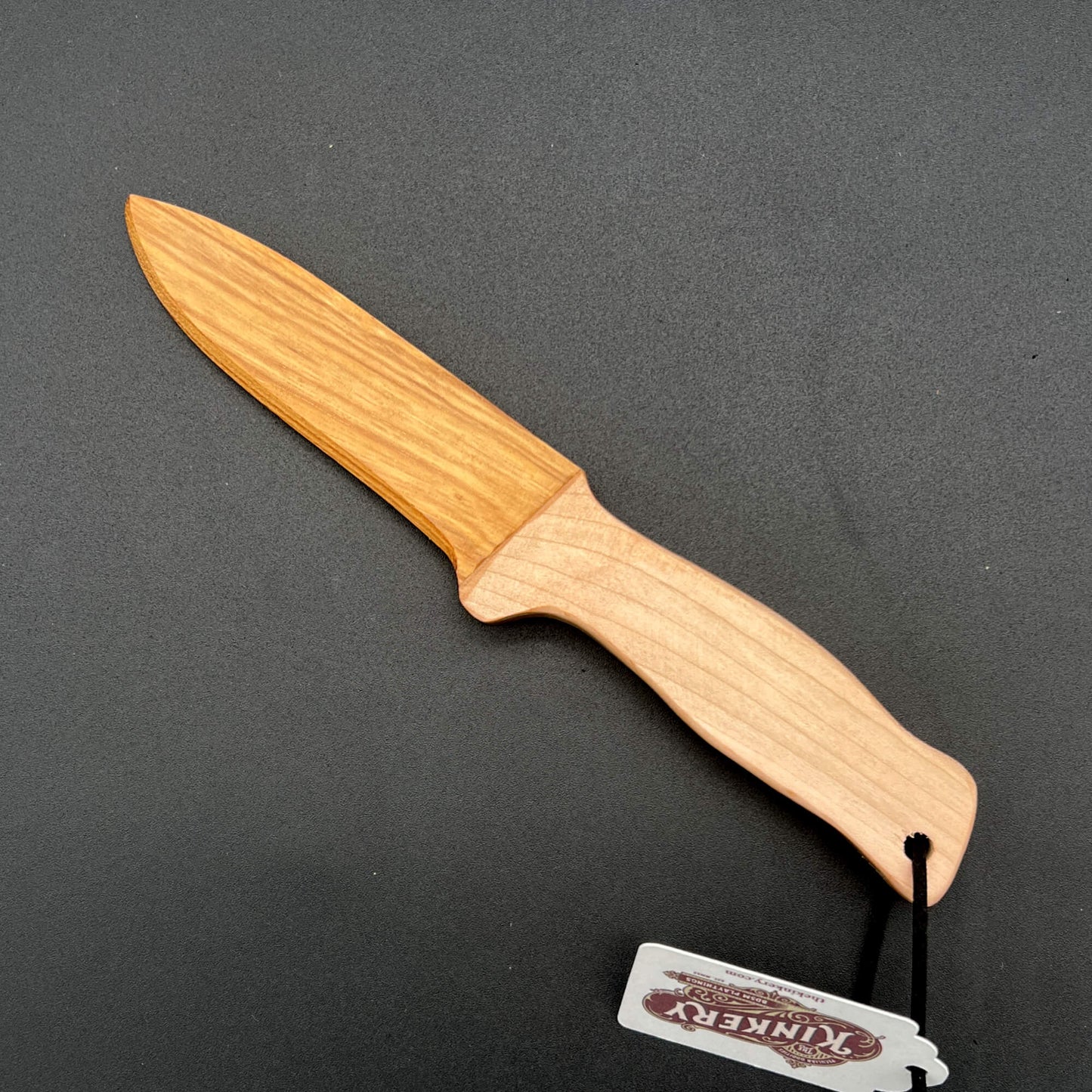 Spearpoint Wooden Knife crafted for wax play and knife play, featuring a genuine straight edge and sharp tip.