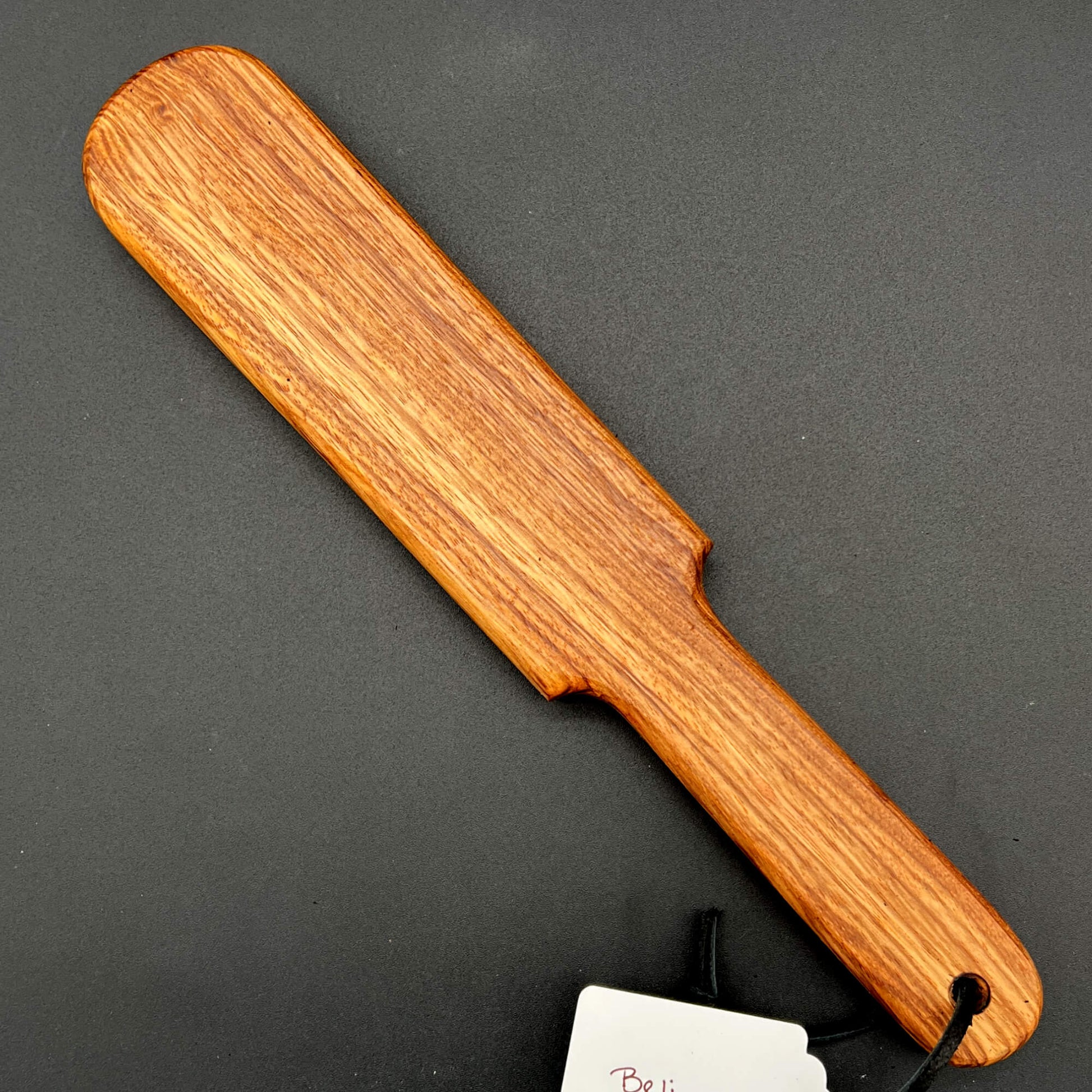 Pounder wooden paddle with natural finish, 12 inches long, simple paddle with rich wood grain.