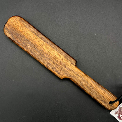 Pounder wooden paddle, simple paddle, finished in natural wax with rich brown wood grain, 12 inches long.
