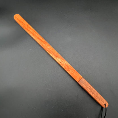 Thick Stick for impact play, a cane-like paddle that combines stingy effectiveness with lightweight design.