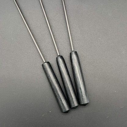 Three black resin handles for the Lips Diabolical Sticks , perfect for BDSM play.