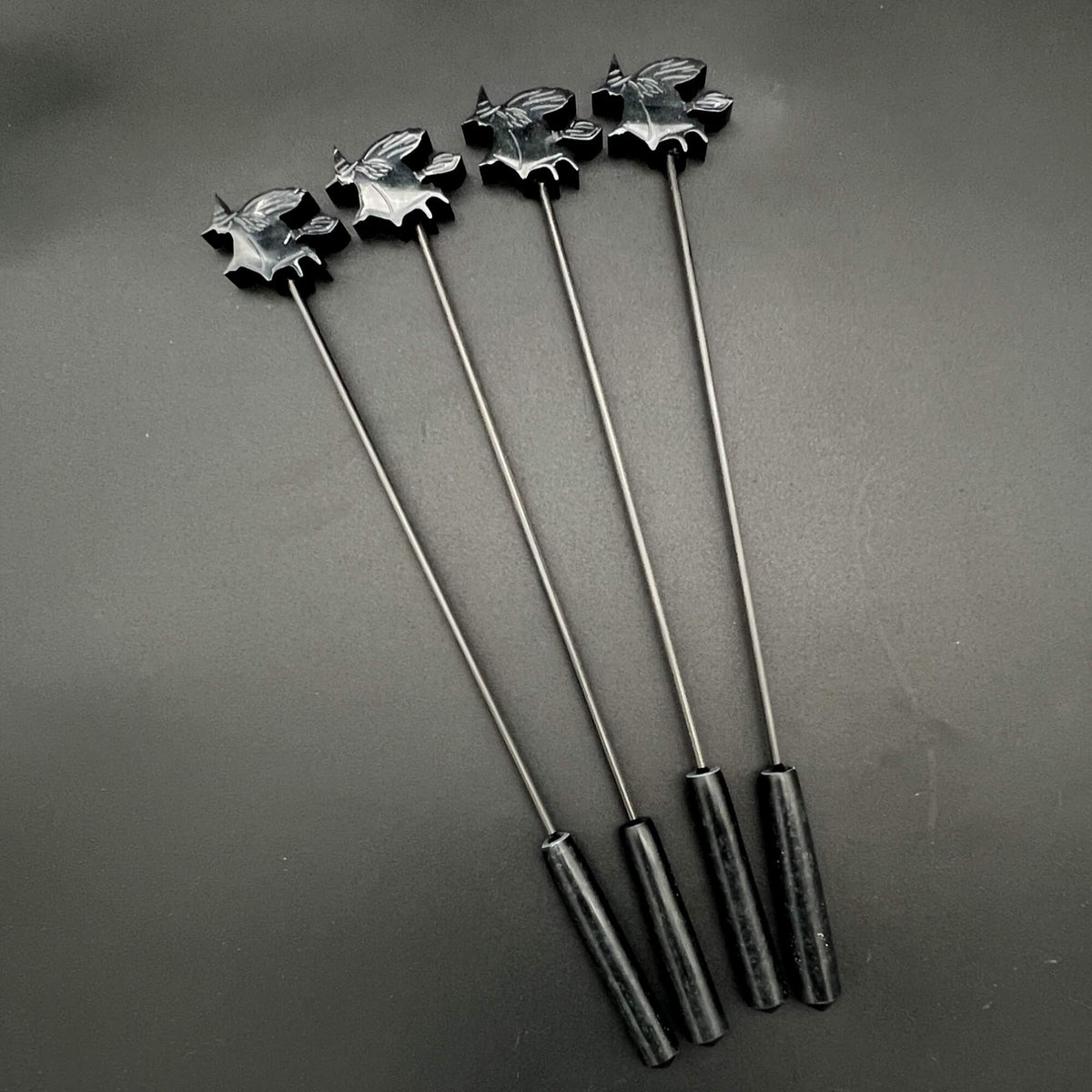 Set of four resin witch tips attached to 3mm carbon fiber rod.