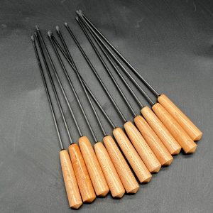 Array of evil sticks made with 3mm carbon fiber rod and maple handles.