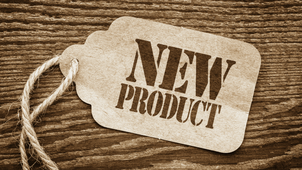 sepia toned image of tag that says new product with rope-like string attached on wooden background as a concept for new products from the kinkery