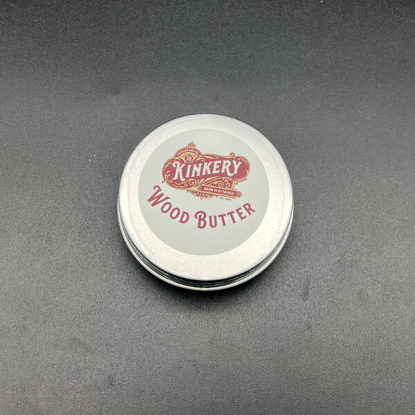 closed container of wood butter with label on the lid -- the label includes the Kinkery logo and the words "Wood Butter"
