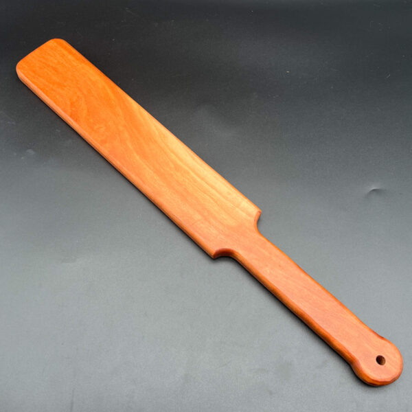 Large wooden paddle made of cherry wood