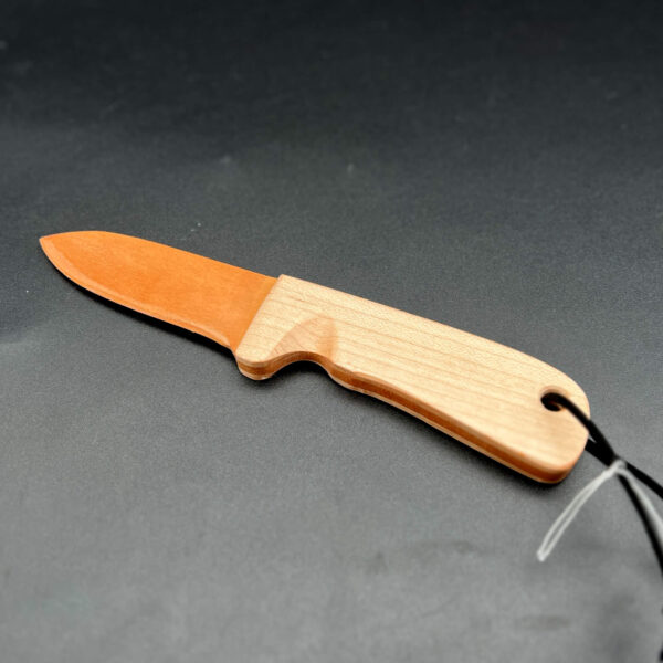 wooden knife made with cherry for the blade, an orange-brown wood, with a maple handle, a white-yellow wood