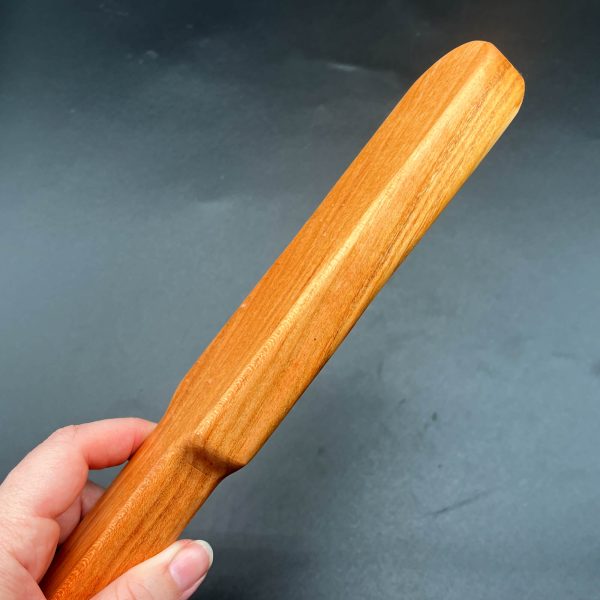 Side view of the Cherry Pounder to show how thick this wooden paddle is - nearly an inch thick