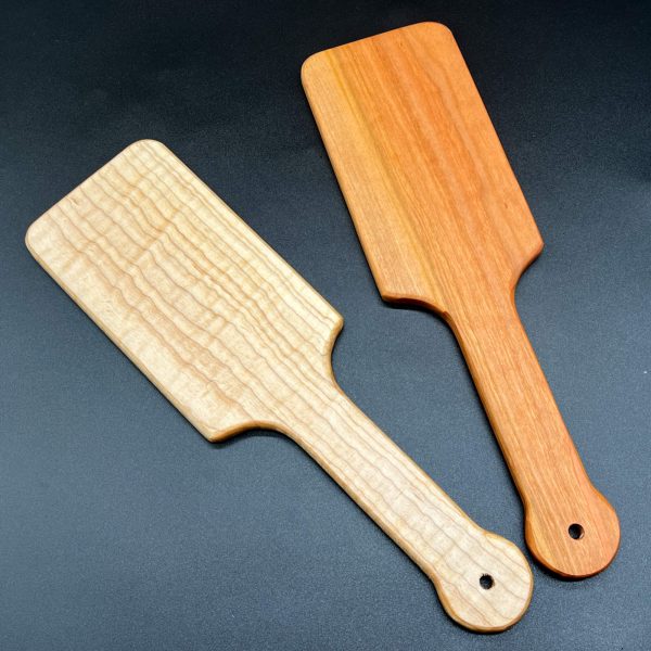 Two hairbrush paddles - maple on the left, cherry on the right