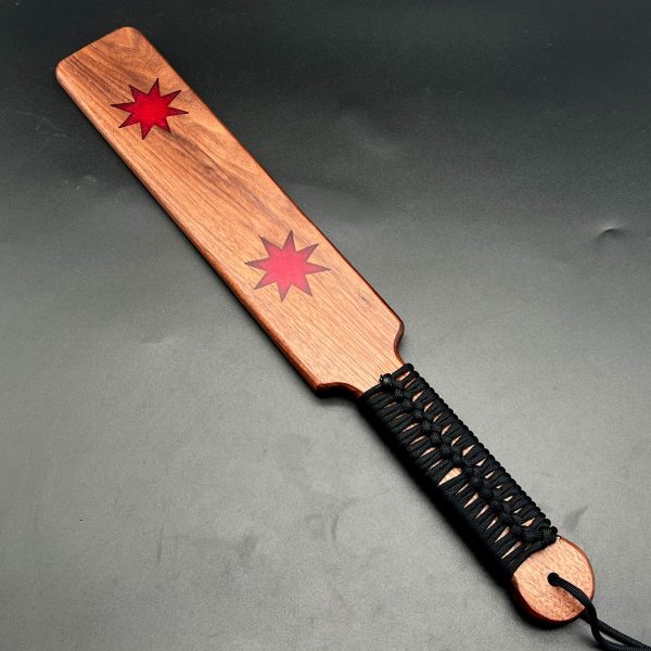 Large Resin Inlay paddle with 2 8-point stars set equidistant along the length of the paddle and filled with red resin