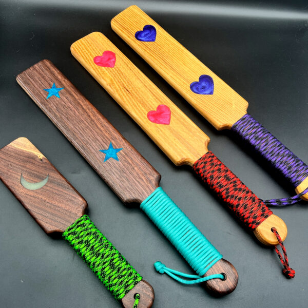 Group of resin inlay paddles - one small and three large