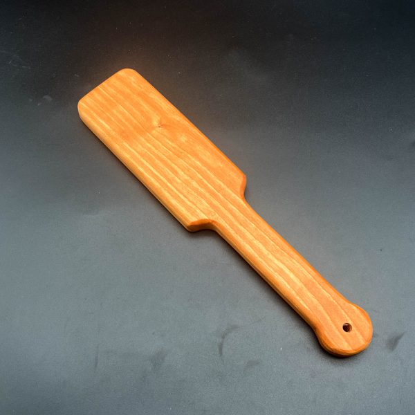 Small wooden paddle made from Etimoe
