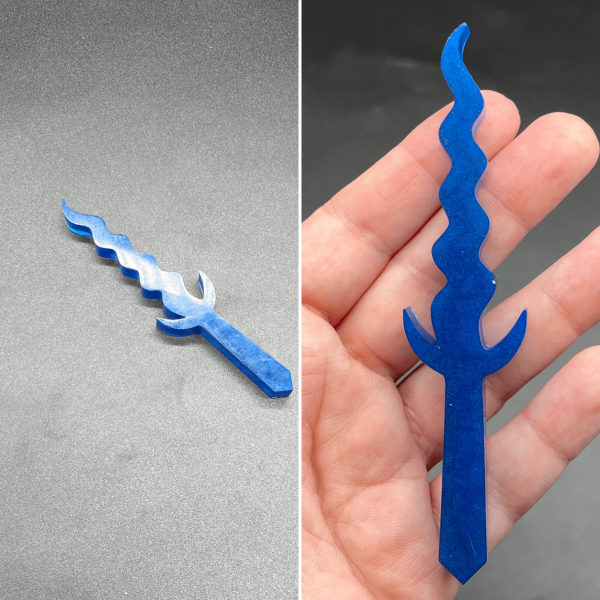 This Kris style dagger is made of blue resin and is a solid color.