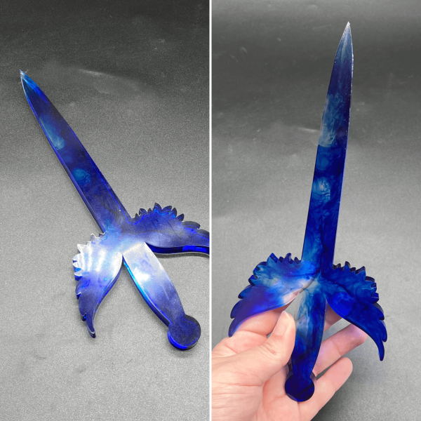 Clear resin with true blue swirls in the poignard dagger