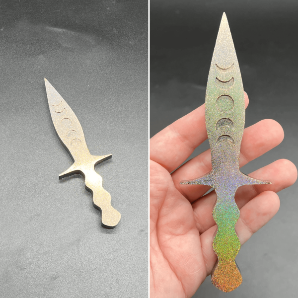 A bronze holographic and black Pugio dagger