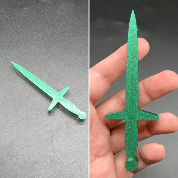 This longsword style dagger is made using green resin.