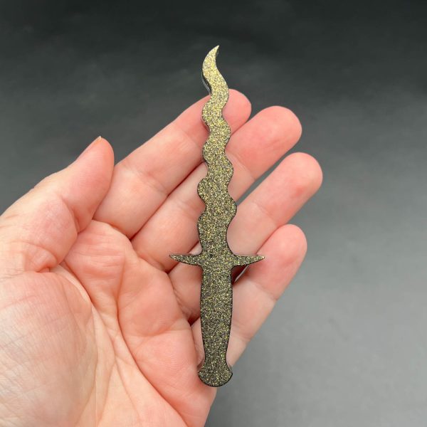 Black resin dagger with gold glitter