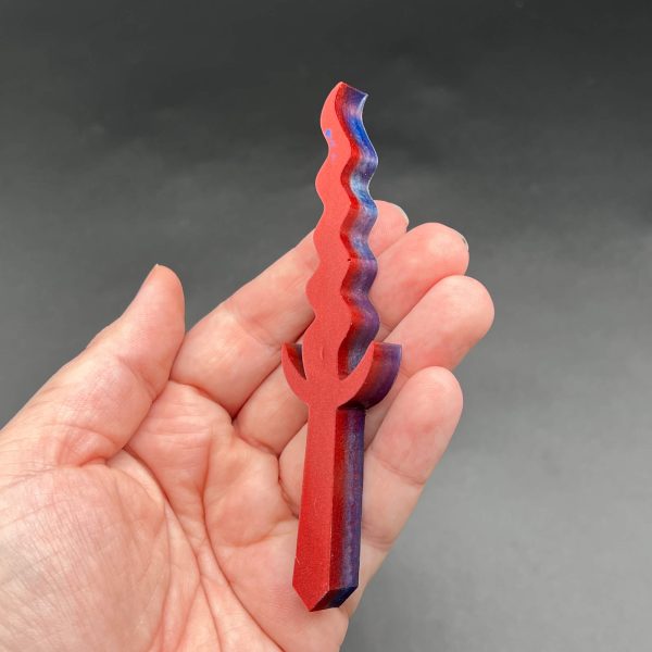 Red and blue resin dager