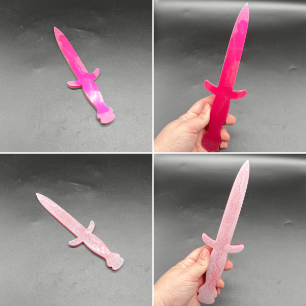 Pink and white resin in Knightly style. Most of the pink color is on one side, and the white is on the back side.