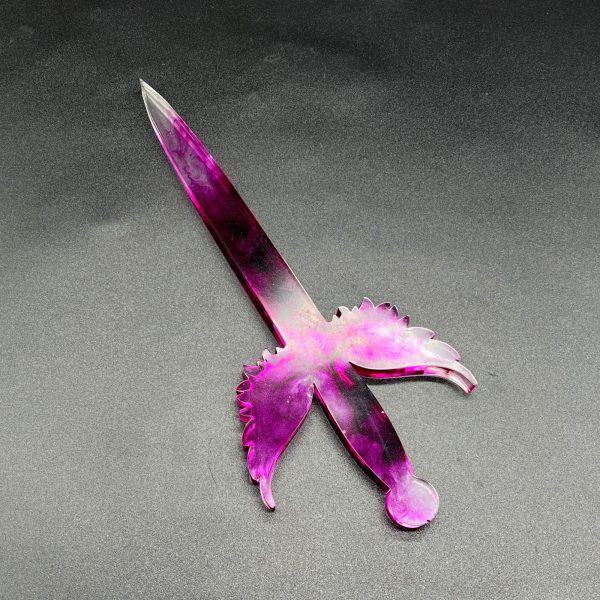 Clear resin dagger with purple swirls