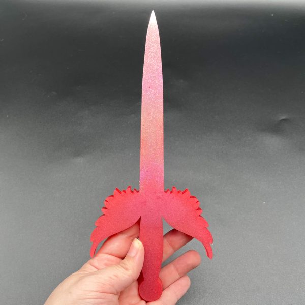 Rose gold dagger with holographic rose gold on the blade