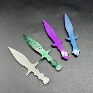 4 Pugio daggers - two with the moon phase: glow in the dark and translucent green; two without the moon phase designs: purple and black and black with a blue colorshift glitter