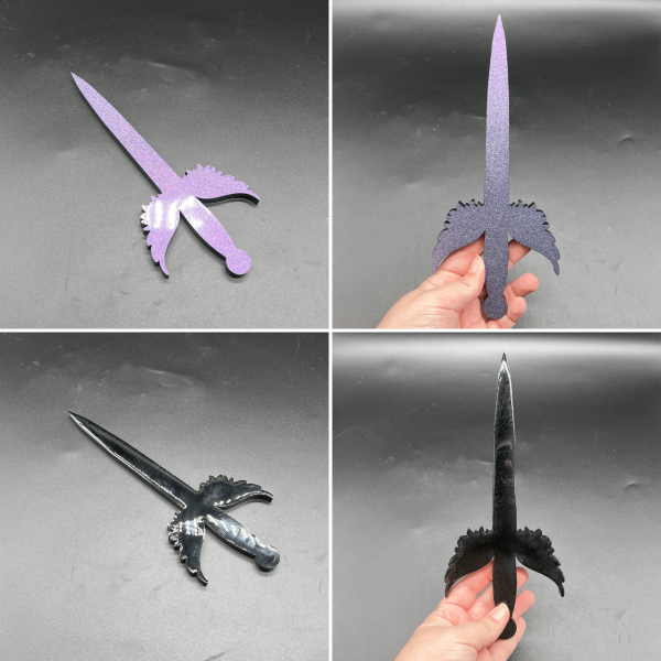 A purple glitter and black resin poignard dagger