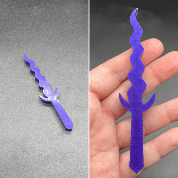 The Kris style dagger in purple resin.