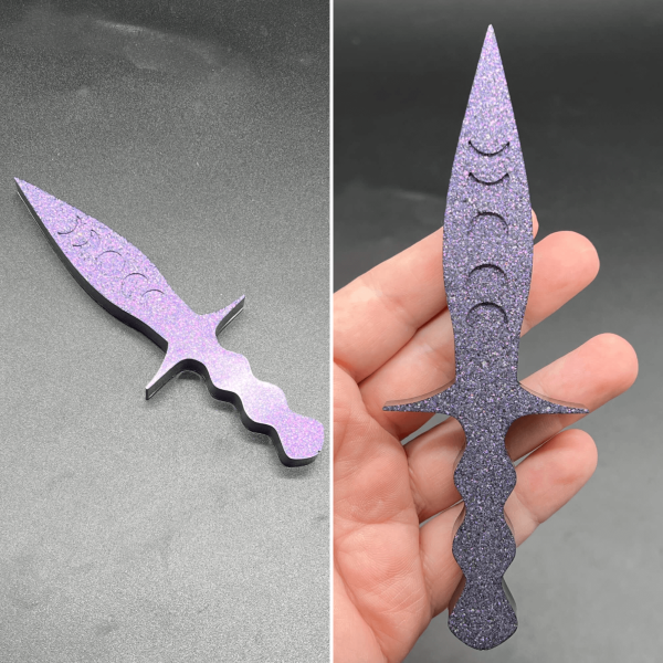 Pugio dagger with a purple sparkle glitter front and the rest is black resin