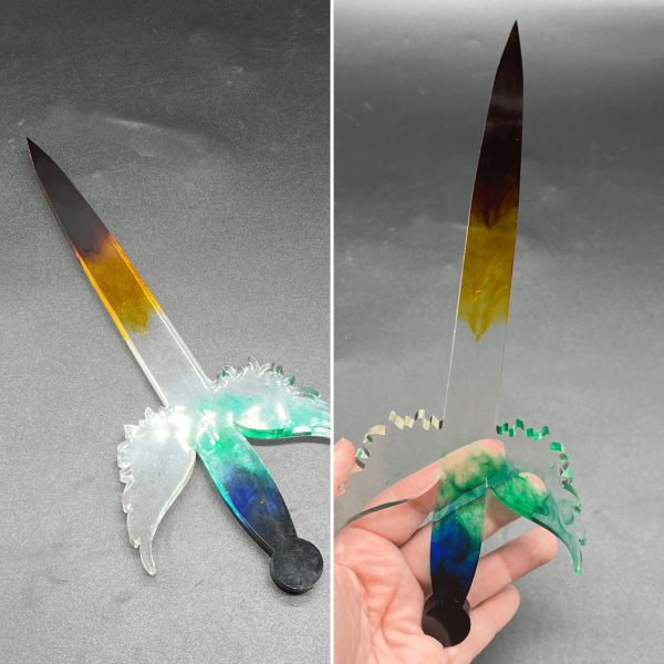 Clear resin dagger with rainbow swirls