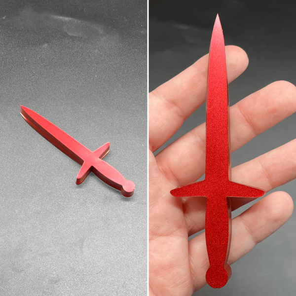 This longsword style dagger is made using red resin.