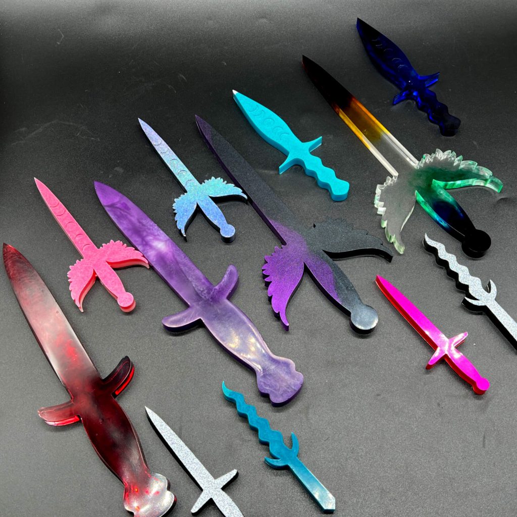 Assorted resin daggers in different sizes and styles