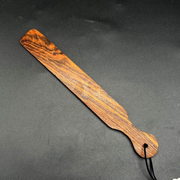 Slapstick made of Bocote, a dark brown wood with much darker stripes in the grain