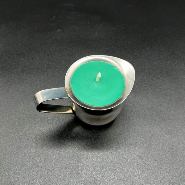 3 ounce green soy wax play candle in a stainless steel container with a handle and pour spout