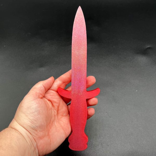 Knightly dagger made with rose gold resin with rose gold glitter on the blade