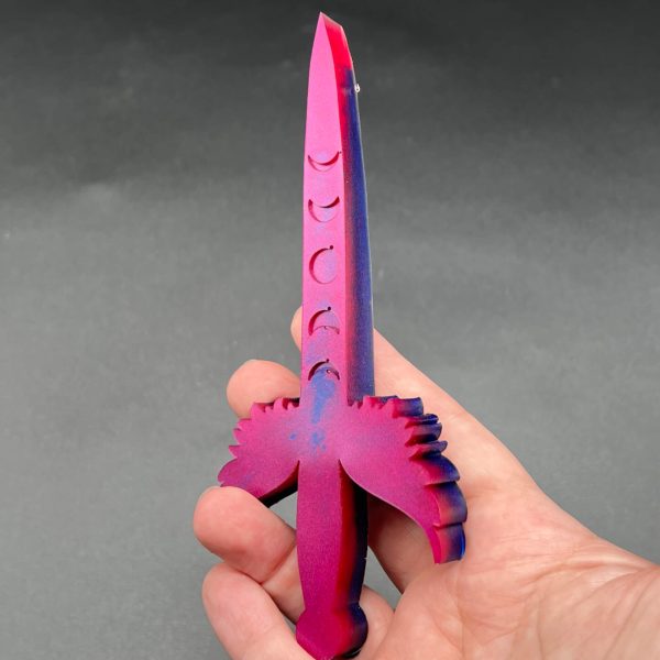 Dagger made of pink and blue resins