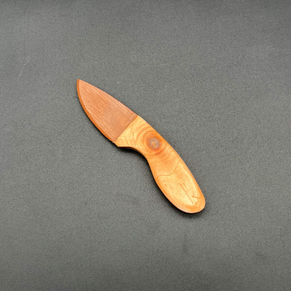 skinner knife made with a black walnut blade