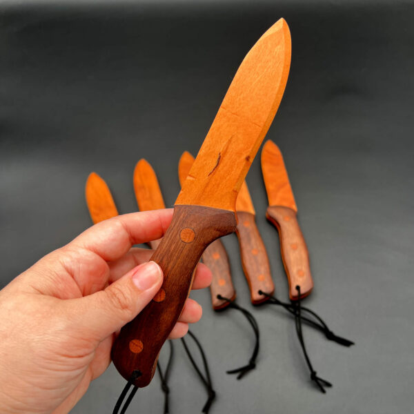 Angled full view of the spearpoint wooden knife